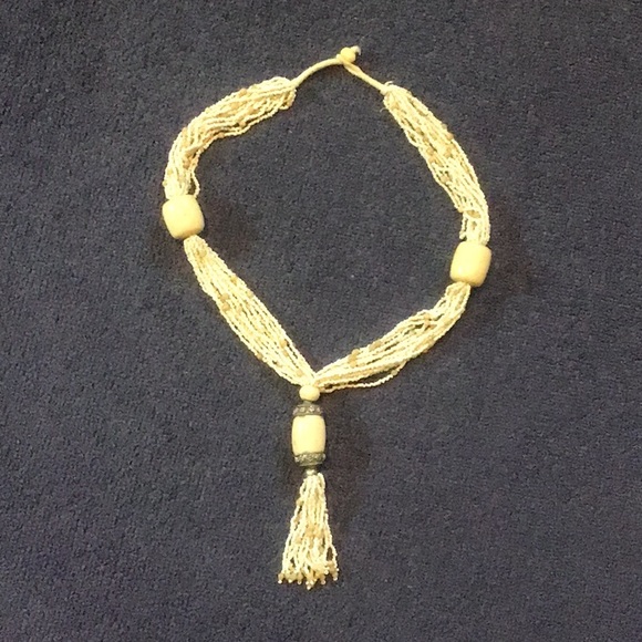 Multi strand tassel necklace w/ ivory like large ornaments - Picture 1 of 3
